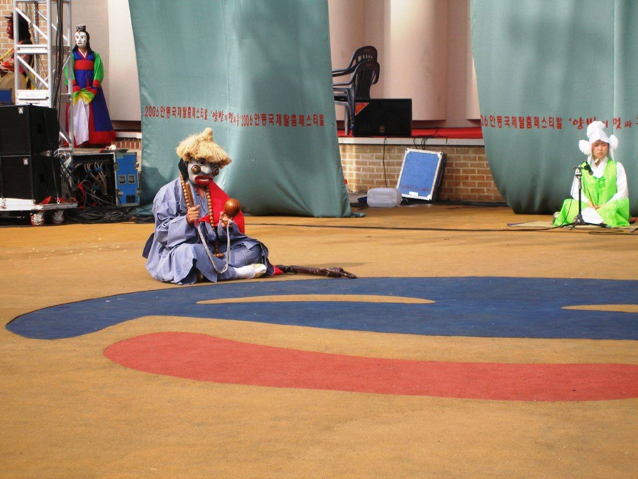 A masked performer in traditional costume at the Andong Mask Dance Festival