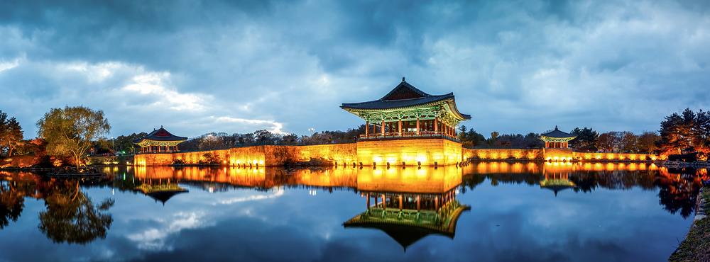 Donggung Palace and Wolji Pond floodlit at night in Gyeongju